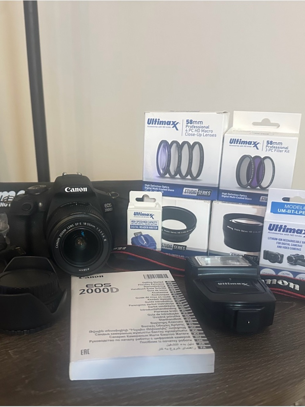 Canon EOS 2000D DSLR Camera with Black Body and Lens Accessories